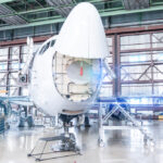 Passenger,Aircraft,Under,Maintenance.,Checking,Mechanical,Systems,Of,Airplane,For